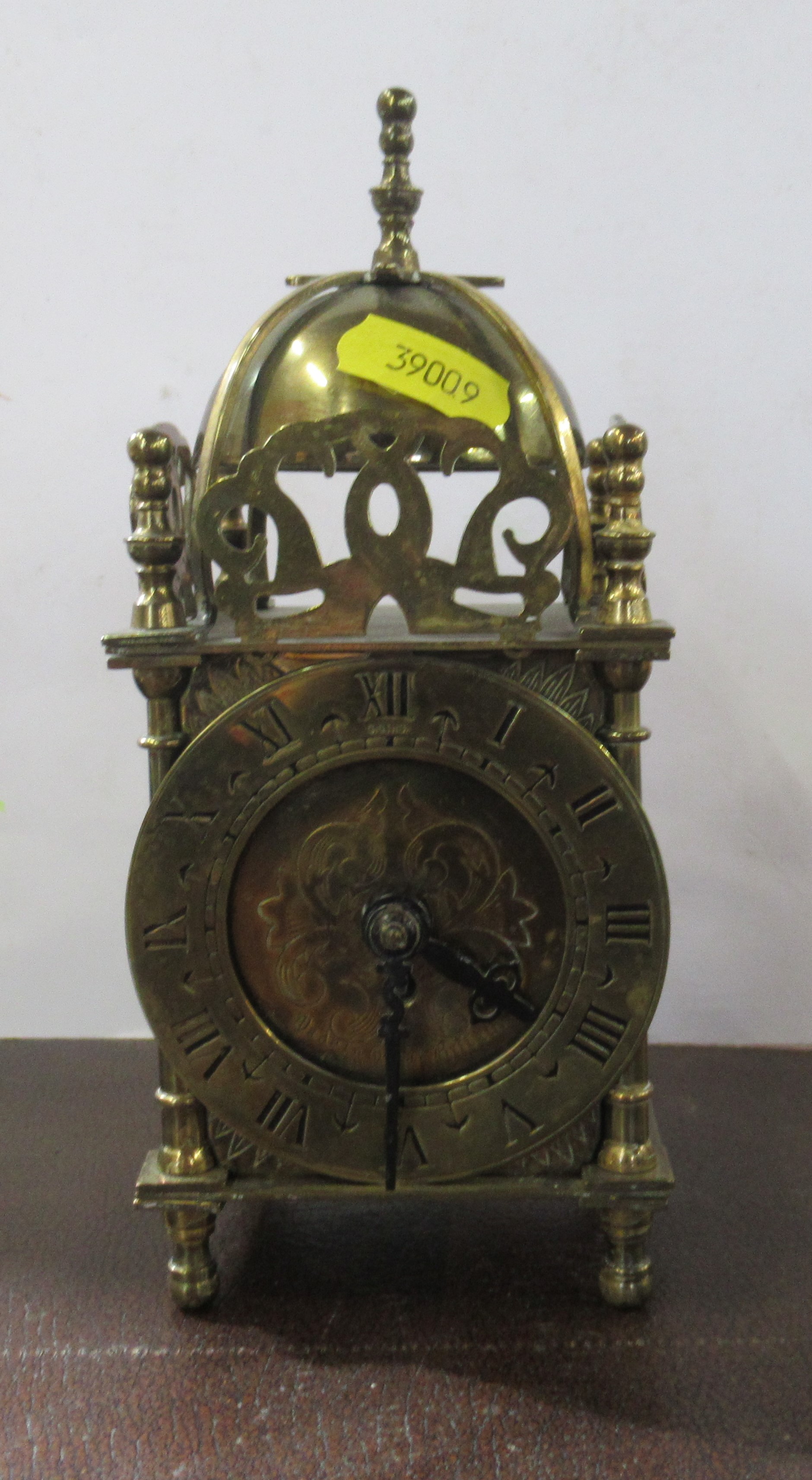 A reproduction brass lantern clock, height 7.5ins