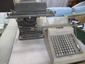 A Remington Type Writer and a Burroughs adding machine