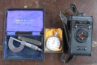 A vest Pocket Kodak camera, together with a Nero Lemania stop watch and a gauge