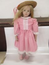 A modern Doll stamped Jacey By Elaine Campbell 1993 height 30ins