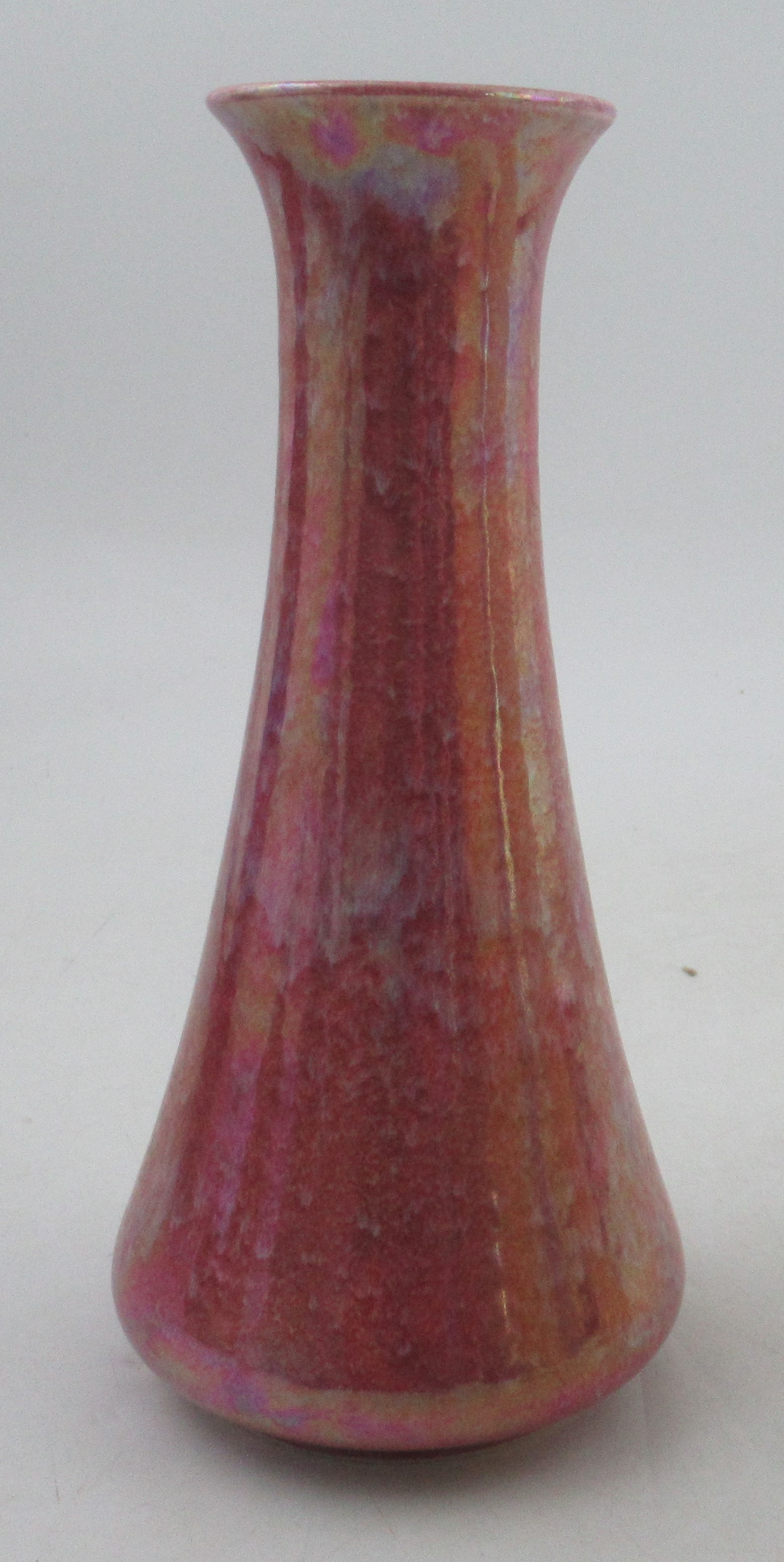 A Ruskin tapered inverse trumpet vase, decorated with a pink ground, impressed marks, dated 1925,
