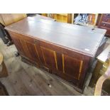 An antique oak mule chest width 56ins depth 21ins height 33ins