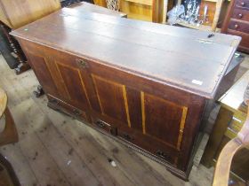 An antique oak mule chest width 56ins depth 21ins height 33ins