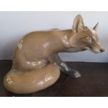A Large Bing and Grondahl model, of a fox, No1958, second quality made before 1948, length 12ins
