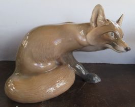 A Large Bing and Grondahl model, of a fox, No1958, second quality made before 1948, length 12ins