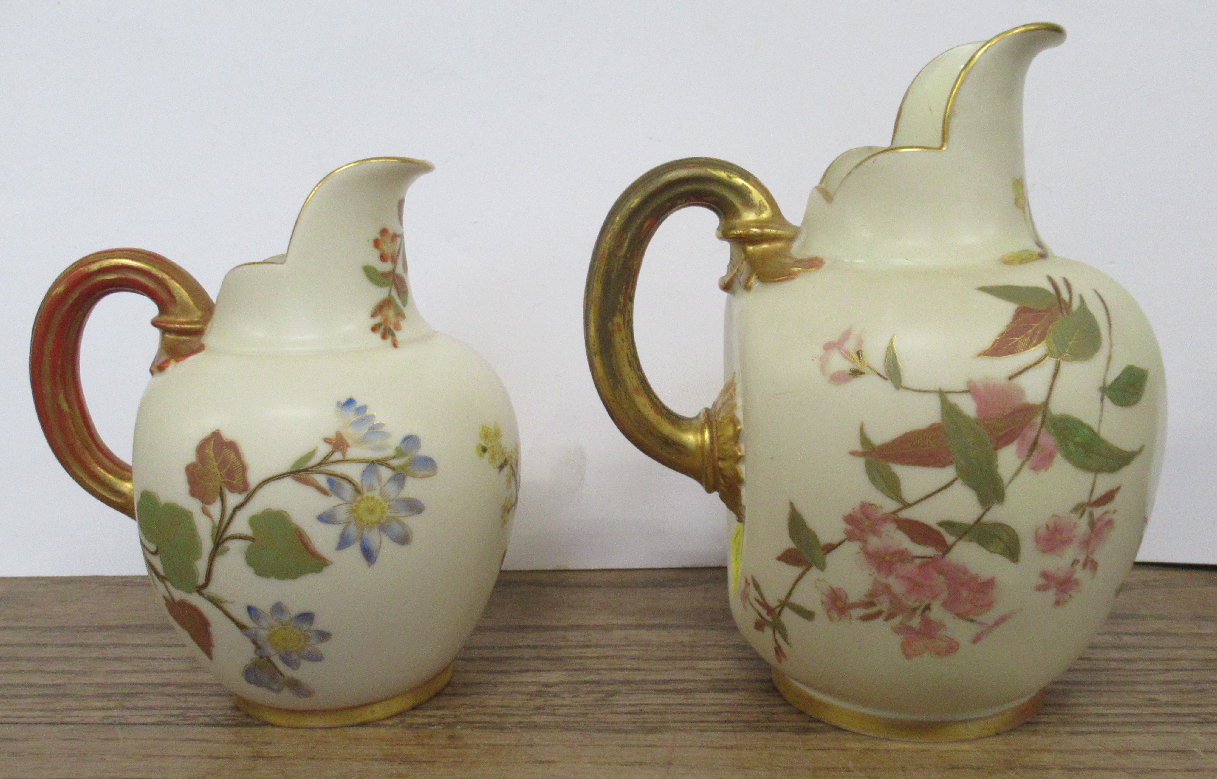 Two Royal Worcester gilt ivory flat back jugs, decorated with shot silk flowers, shape No. 1094, - Image 2 of 5