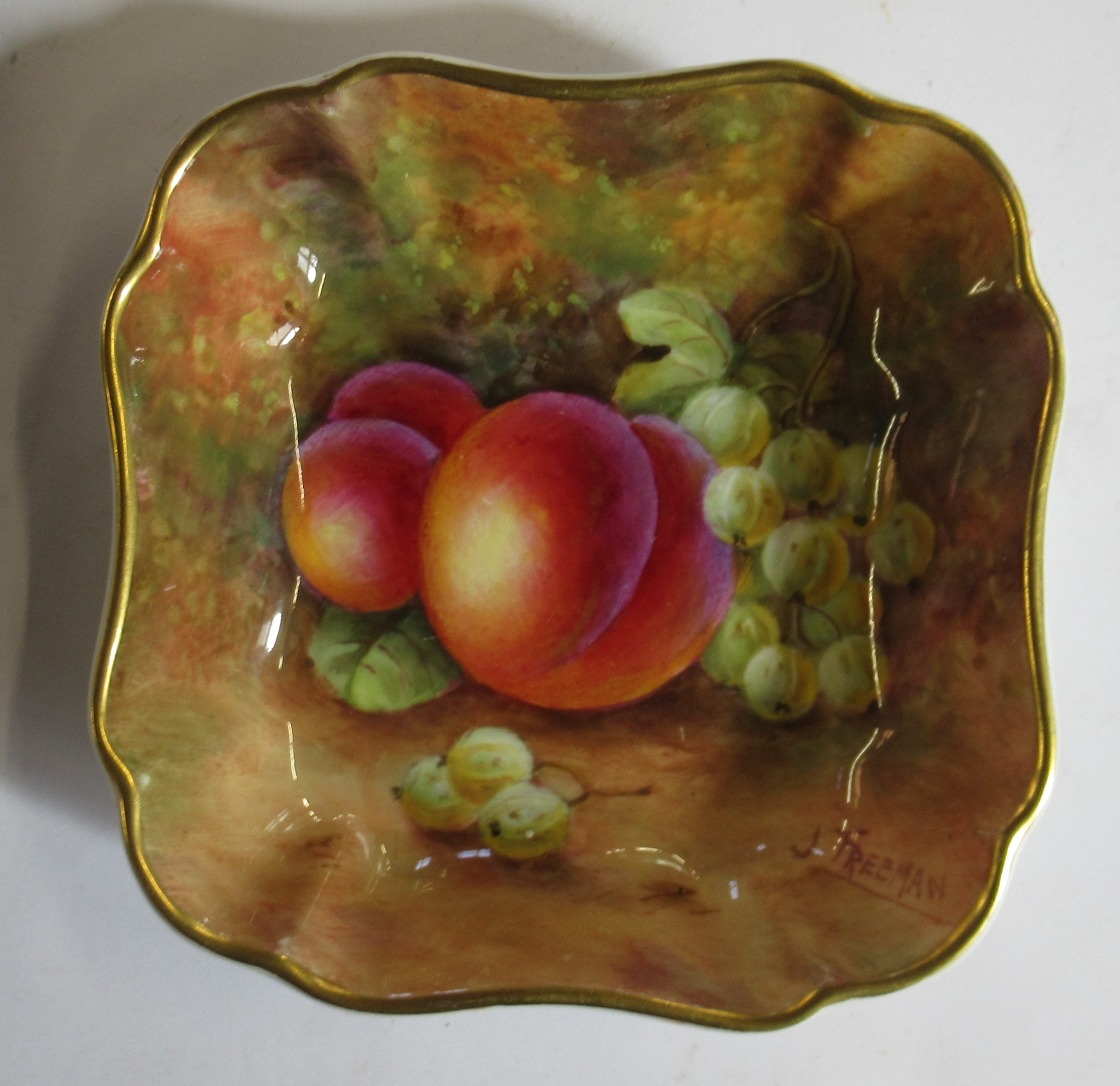A Royal Worcester shaped square dish, decorated with fruit to a mossy background by Freeman, af,