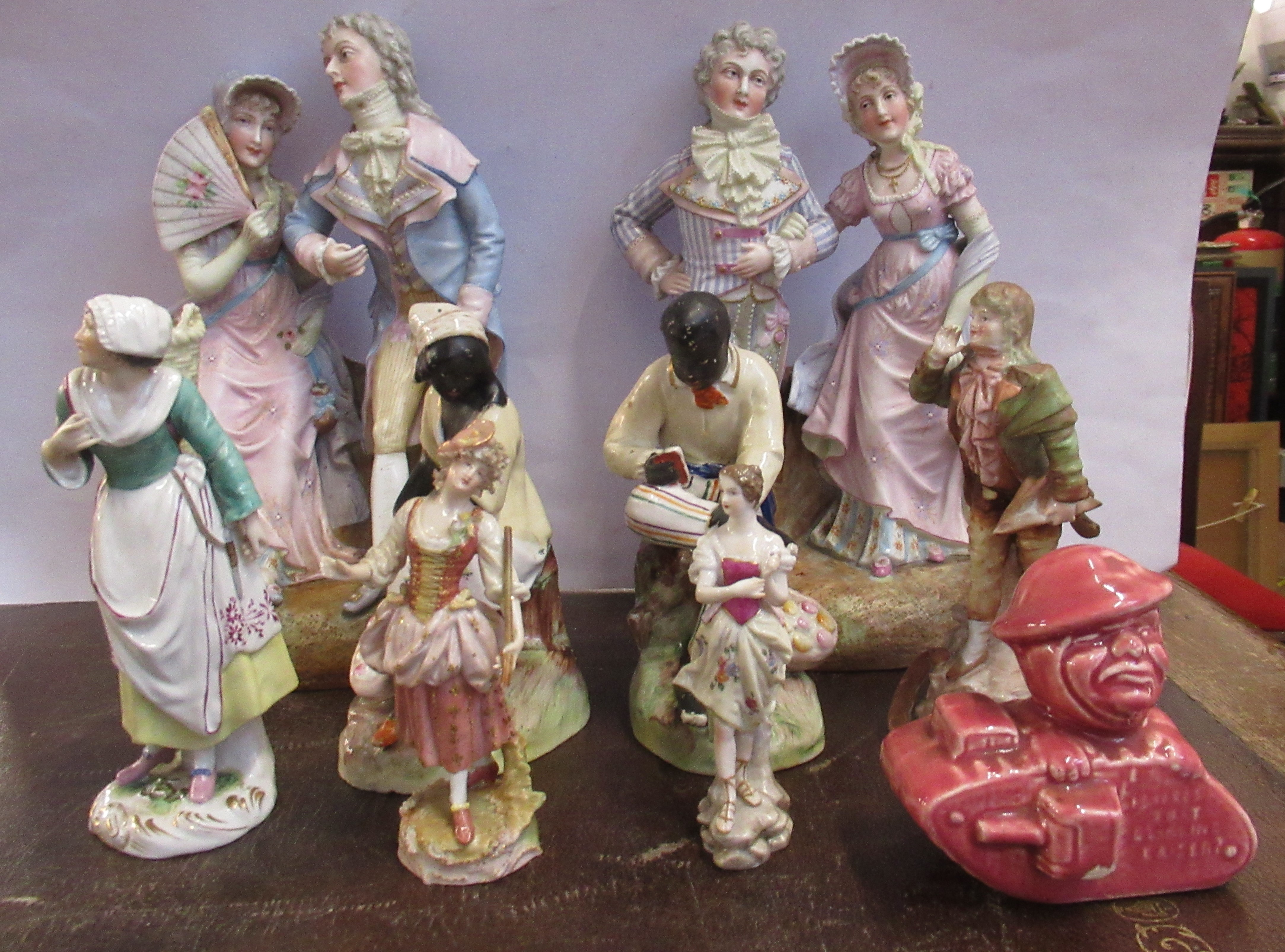 A collection of porcelain figures, and other items Condition Report: The figure holding the hat sold - Image 3 of 3