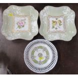 A pair of Chamberlains Worcester shaped square dishes, decorated with flowers, together with a