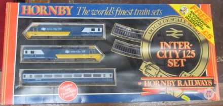 A boxed set of Hornby Intercity 125 trains and track, together with a boxed Hornby Railways electric