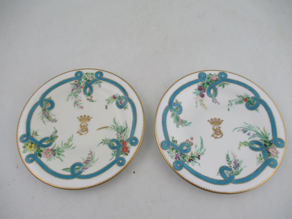 Two Chamberlains Worcester plates decorated with central coronet monogrammed with SD below to a