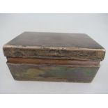 A silver cigarette box, with engine turned decoration and wooden lined interior, 5.5ins x 3.5ins