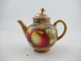 A Royal Worcester miniature teapot decorated with hand painted fruit by Townsend 3.25ins