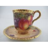 A Royal Worcester coffee cup and saucer decorated with fruit by Freeman  Condition Report: Good