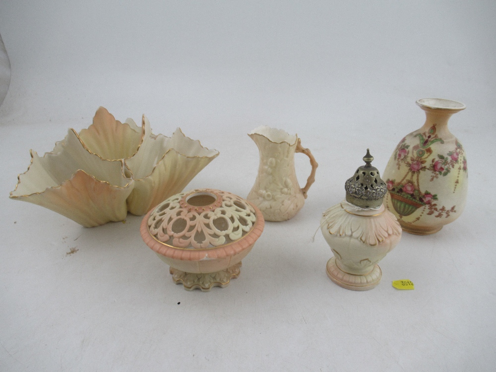 A collection of Locke and Co  Worcester blush ivory to include a center piece jug together with a