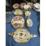A collection of Aynsley tea ware decorated with fruit to include tea pot, sugar bowl etc