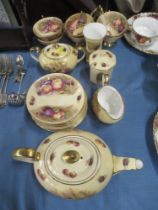 A collection of Aynsley tea ware decorated with fruit to include tea pot, sugar bowl etc