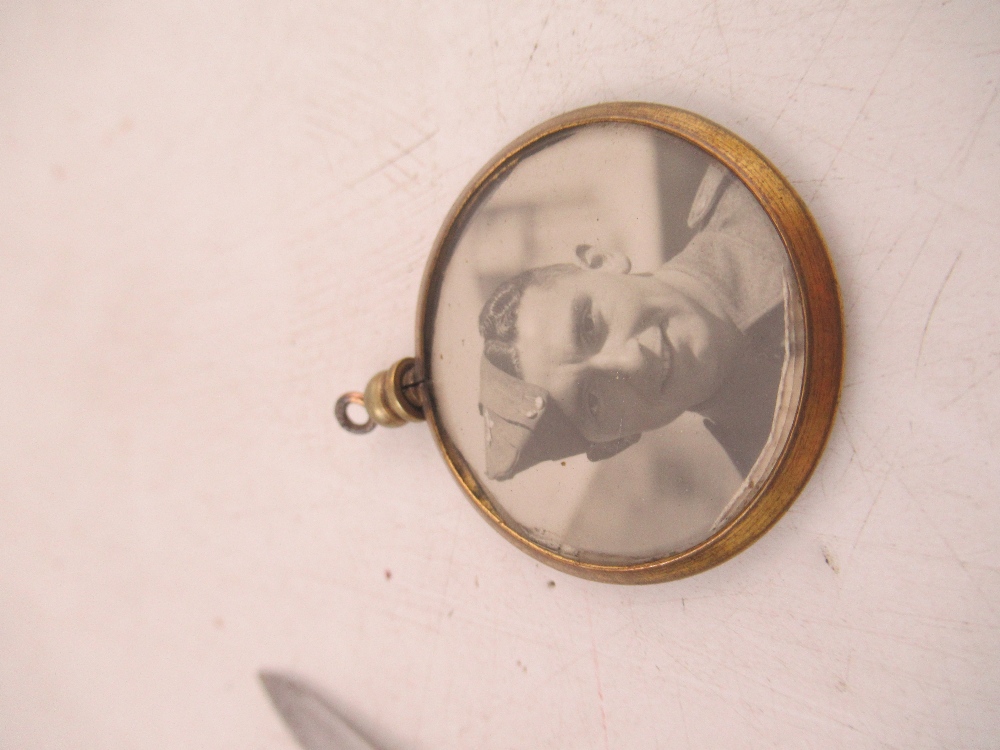 A gilt metal double sided Photograph locket, watch Key and Mother of Pearl cased double bladed - Image 2 of 6