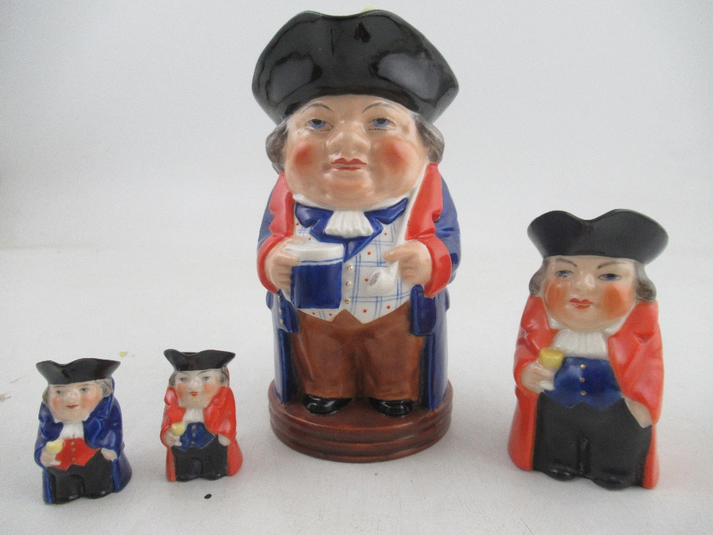 A Royal Worcester Toby jug Shape No 2831 6ins, together with 3 smaller Toby jugs  Condition