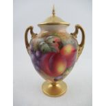 A Royal Worcester porcelain covered vase decorated half round with hand painted fruit by Ayrton
