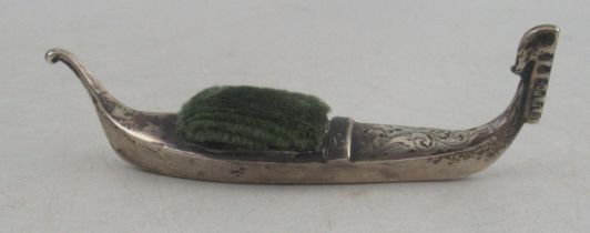 A silver pin cushion, modelled as a gondola