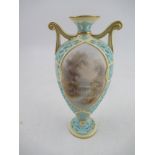 A Grainger's  Worcester turquoise pierced vase with reserved landscape panels, height 7.5ins