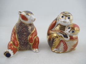 A Royal Crown Derby paperweight of a seated bear and Monkey group