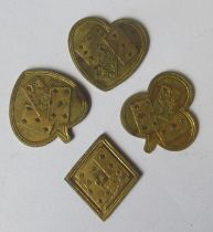A set of four Victorian gilt metal tokens, formed as the four playing card suits
