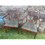 A pair of 19th century style armchairs