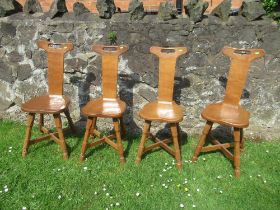 Foxman Don Craven (Boroughbridge), a set of four oak spinning dining chairs, with handle aperture to