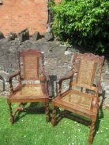 A pair of Anglo- Indian  armchairs, with caned back and seats and carved decoration