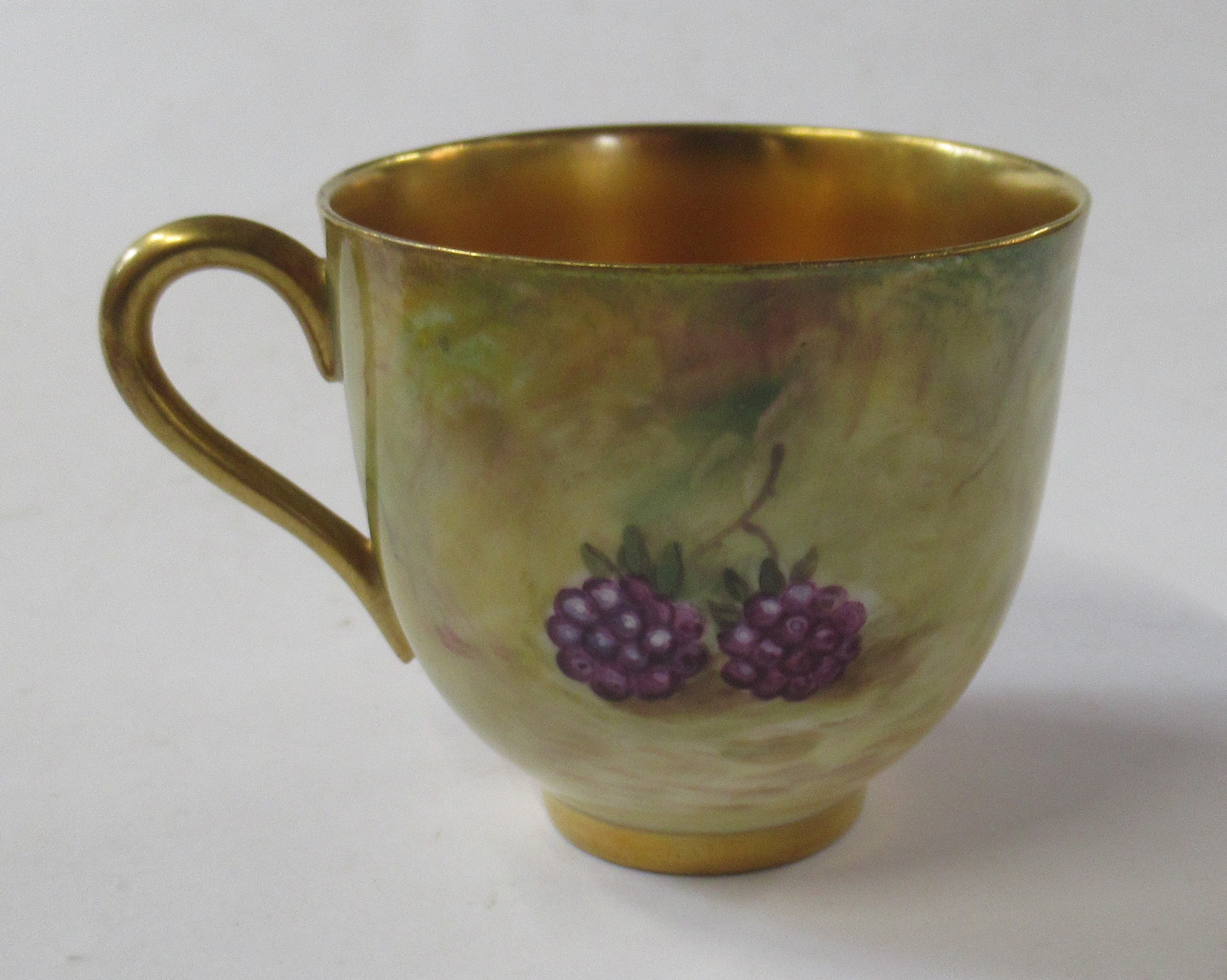 A Royal Worcester cabinet cup and saucer, decorated with fruit to a mossy background, the cup by E - Image 5 of 8