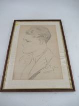 A portrait of a gentleman in profile monogramed BS dated 1934 17ins x 12ins