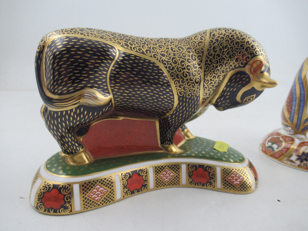 A Royal Crown Derby paperweight of a seated fawn and a standing bull - Image 2 of 5