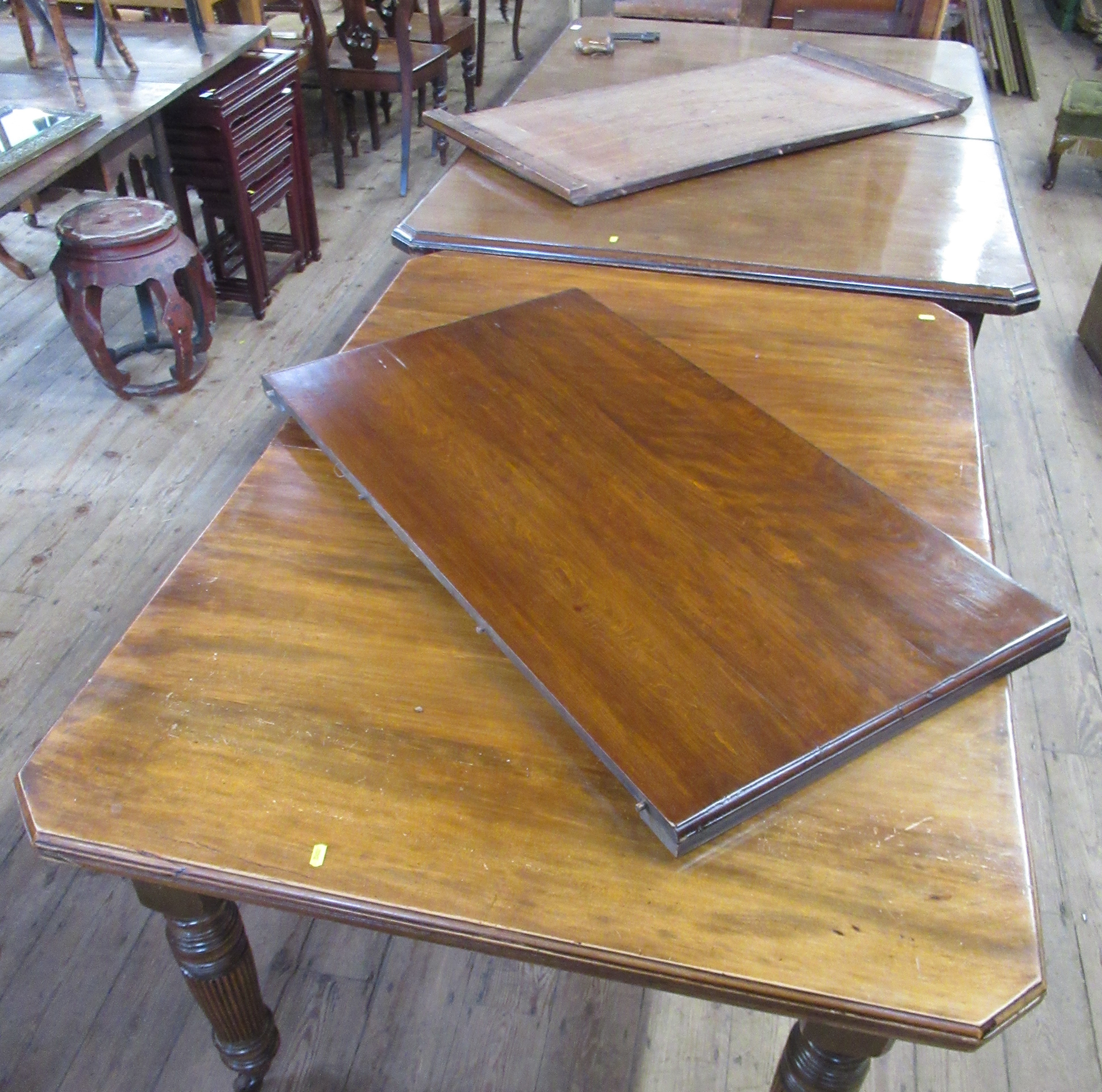 Two 19th century mahogany extending dining tables, each table has an extra leaf and handle, total - Image 2 of 6