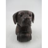 A carved Black Forest Inkwell Modelled as a St Bernard with Brandy Barrel