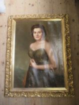 A 20th century English school oil on canvas portrait of a lady wearing a ball gown indistinctly