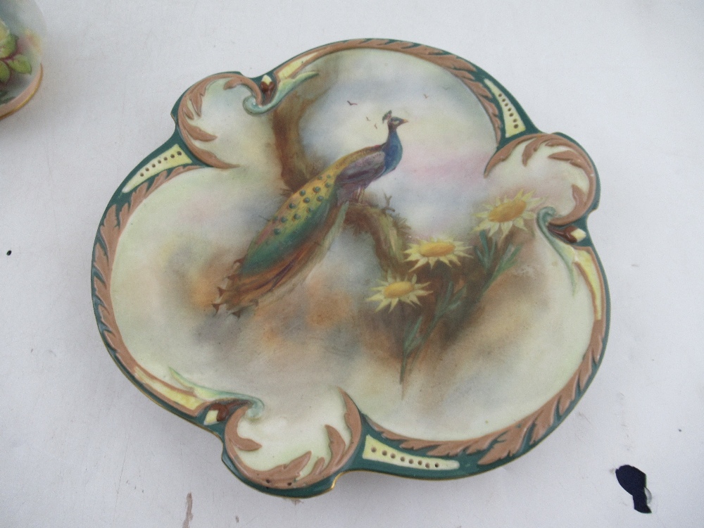 A Hadley's Worcester wall plate, of trefoil form, decorated with a peacock, together with a Royal - Image 2 of 5