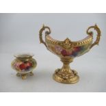 A Royal Worcester oval center piece, decorated with Autumnal leaves and berries by Kitty Blake,