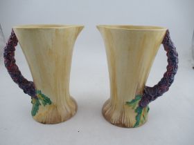 A pair of Clarice Cliff Bizarre My Garden pattern jugs height 9.25
