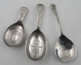 A silver caddy spoon, with Celtic design to the handle, maker Amy Sandheim, together with a Georgian