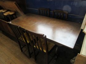 An oak dining table, 22ins x 60ins, together with four dining chairs