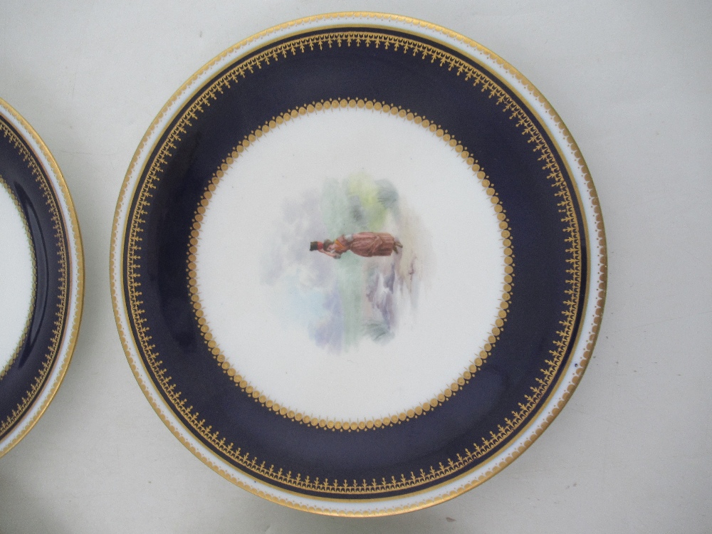 Six Grainger Worcester plates decorated with central panels of figures in a landscape to a deep blue - Image 2 of 9