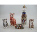 A Royal Crown Derby Egyptian cat and four other cat paperweights