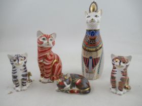 A Royal Crown Derby Egyptian cat and four other cat paperweights