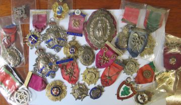 A collection of silver and silver gilt Lodge medal, most with ribbons and bars