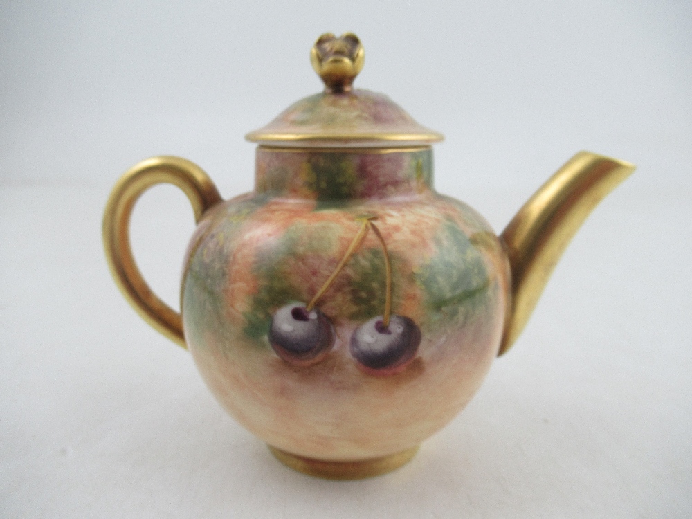 A Royal Worcester miniature tea pot by Roberts height 3.25ins  Condition Report: Good condition, - Image 2 of 5