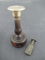 A 19th century lignum vitae desk seal, with engraved steel stamp, together with another seal, carved