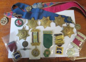 A collection of gilt medals, to include ones by Toye & Co