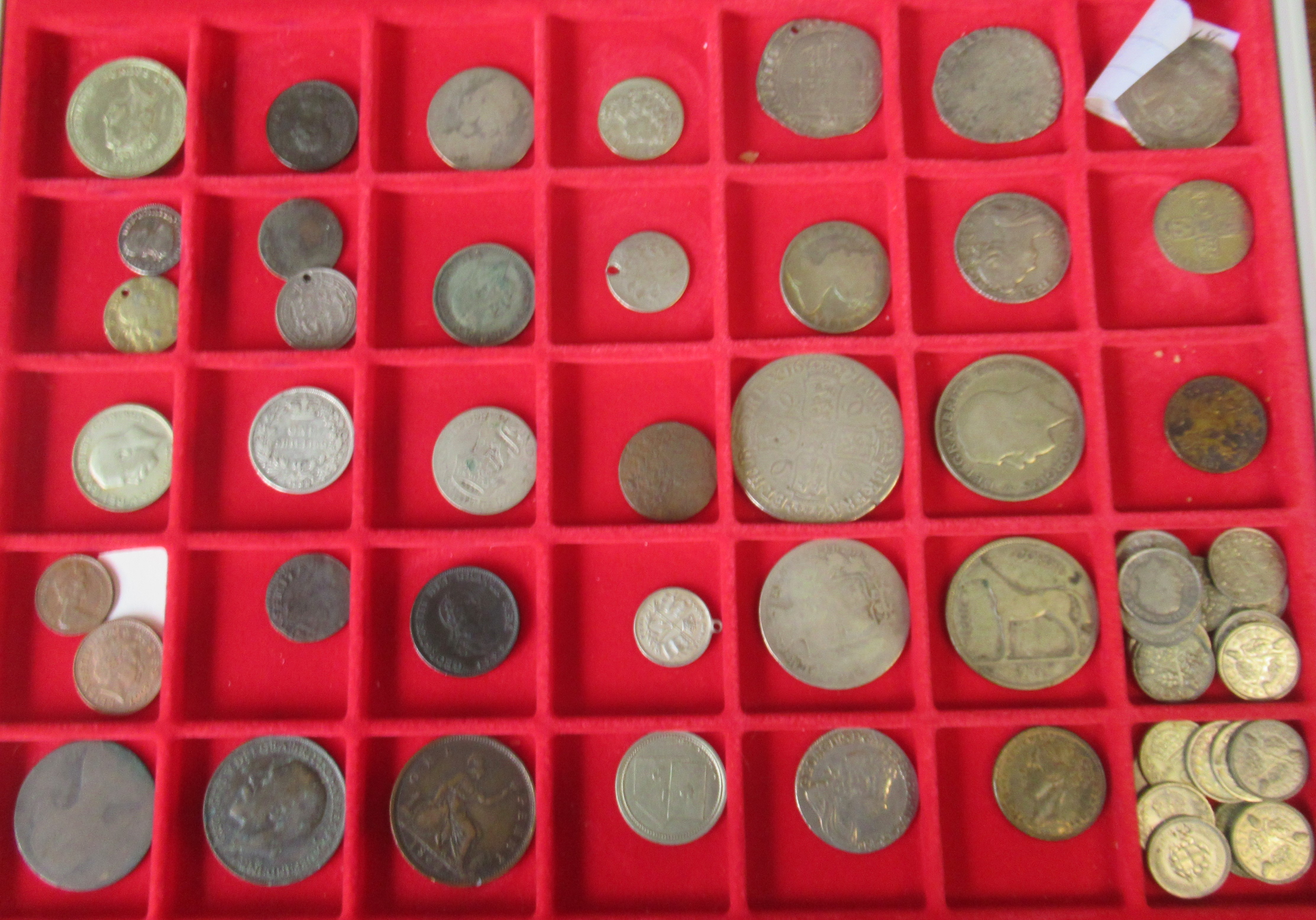 A collection of Antique silver coins, to include Shillings, Three pence's and other coins